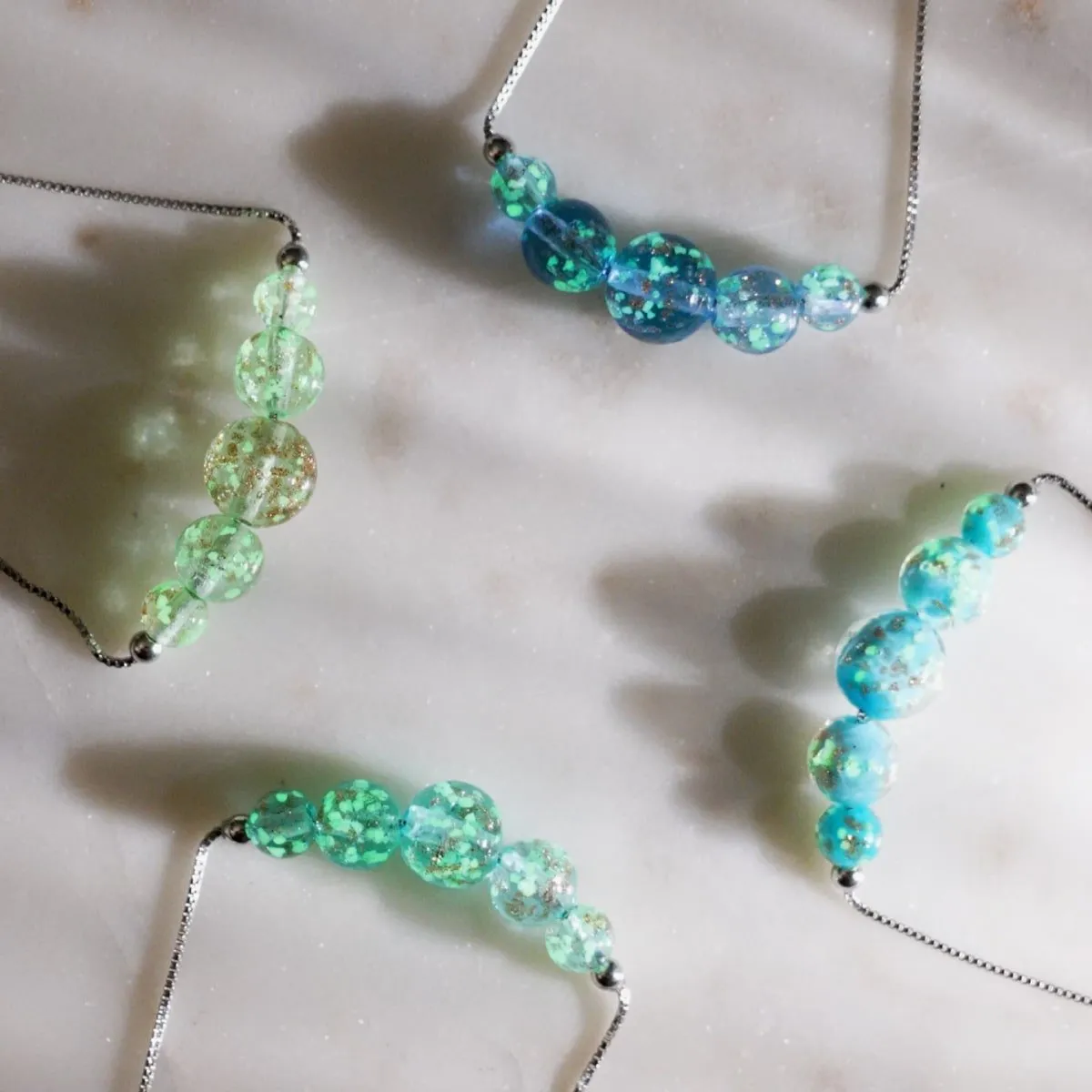 Arctic Blue | .925 Sterling Silver | Firefly Glass Infinity Clasp Necklace