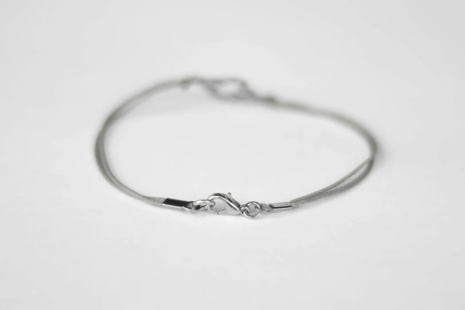 Bracelet for men, stainless steel clover charm, gray cord, waterproof bracelet