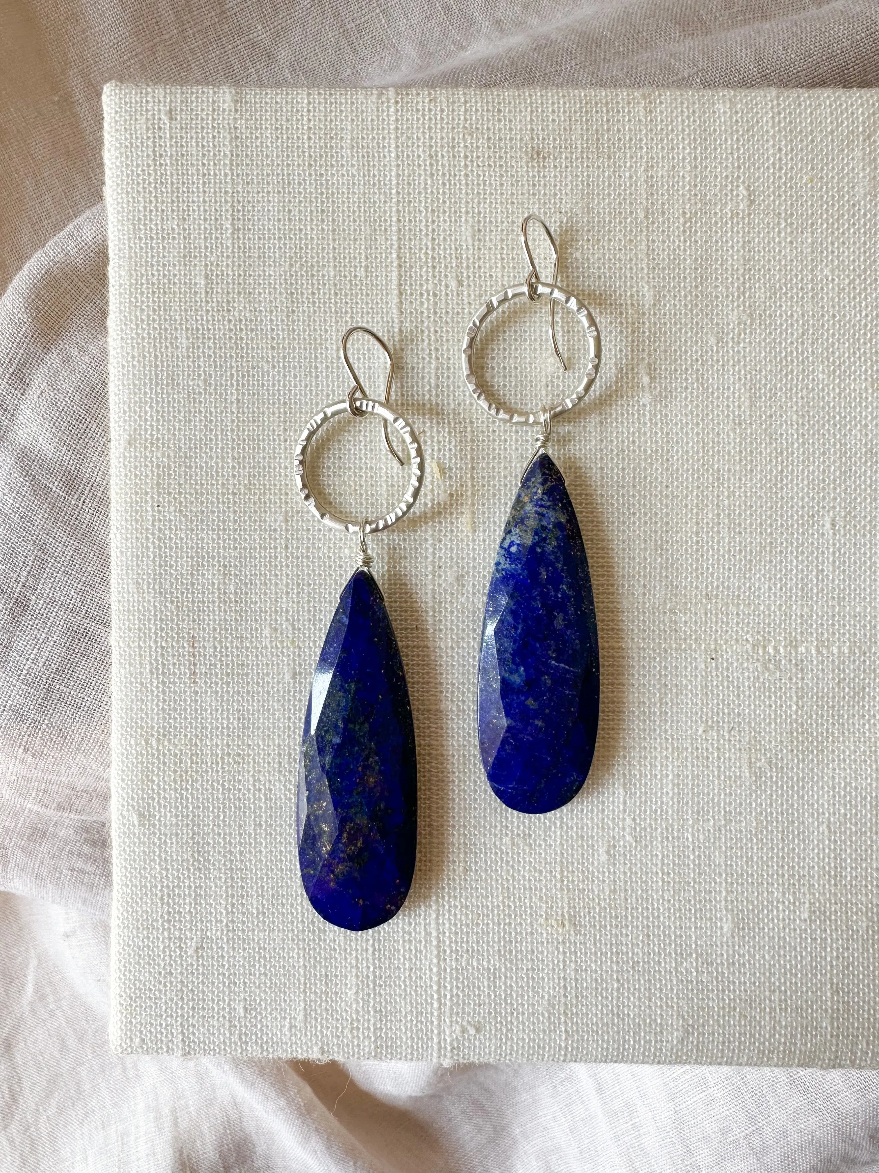 E2308 - hammered circles with faceted lapis
