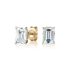 Emerald cut stud earrings with 2.24 carats* of diamond simulants in 10 carat yellow gold