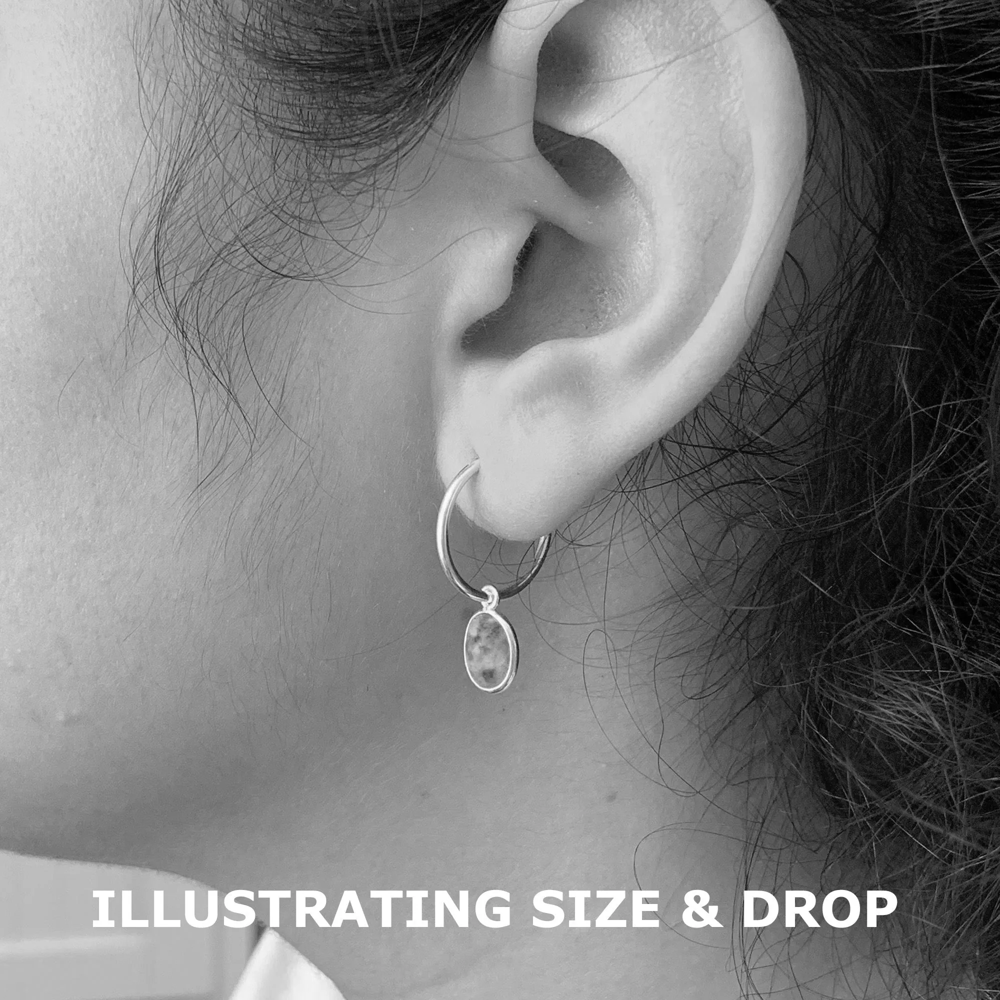 Gemstone earrings with lapis lazuli (blue) oval crystal drops on silver small hoops