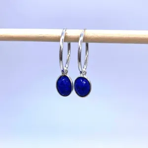 Gemstone earrings with lapis lazuli (blue) oval crystal drops on silver small hoops