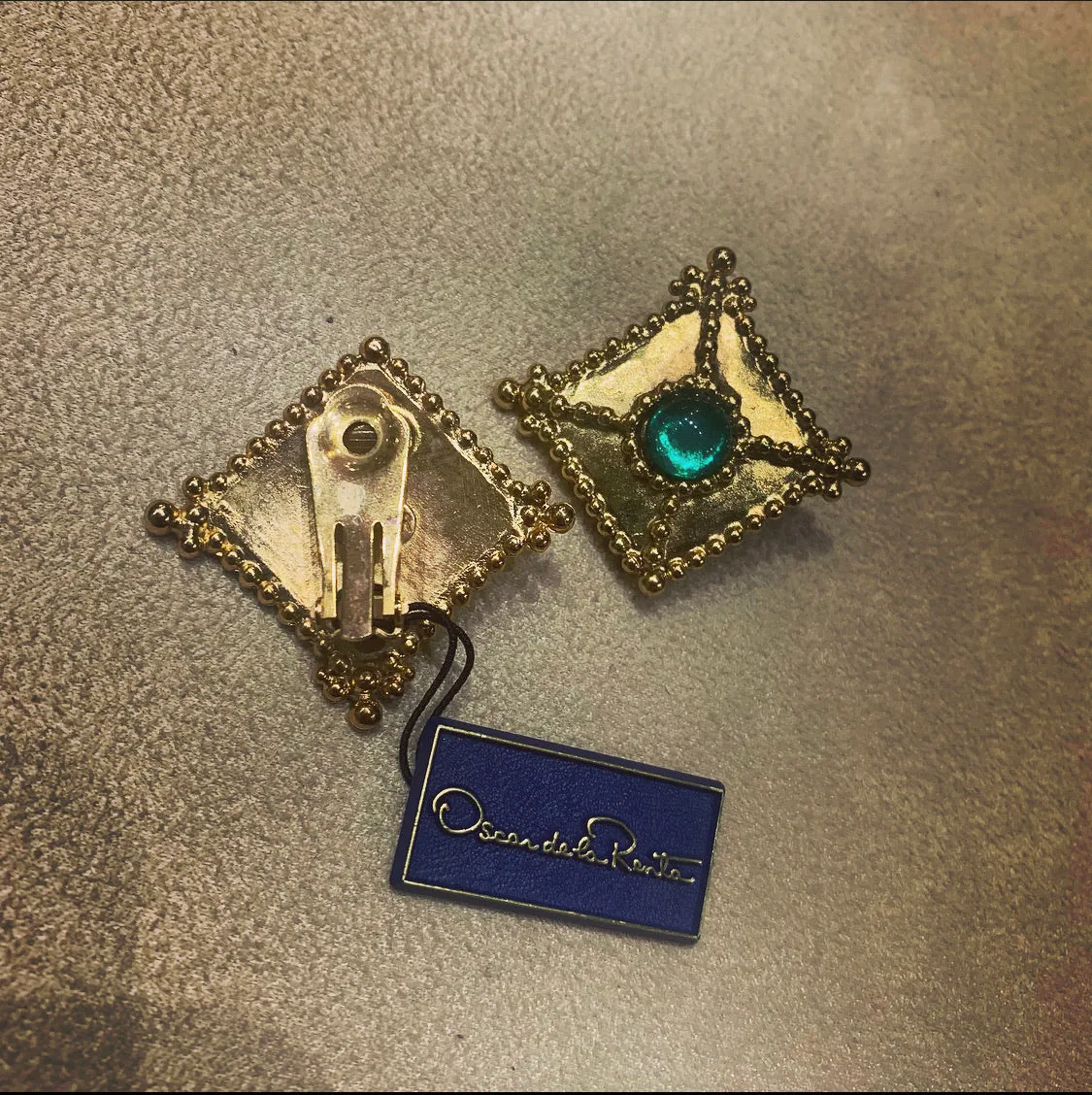 Green square clip on earrings by Oscar de la Renta