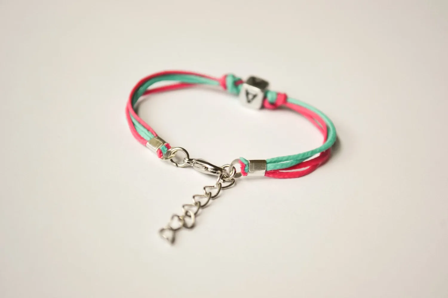 Initial bracelet for children, pink and turquoise cord