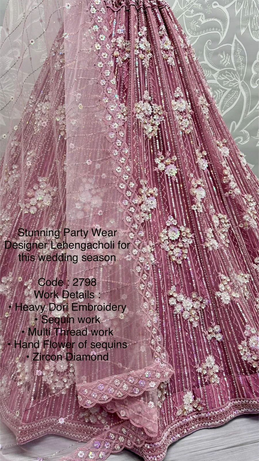 Pink Bridal Net Lehenga with Stunning Embroidery and Stone Work