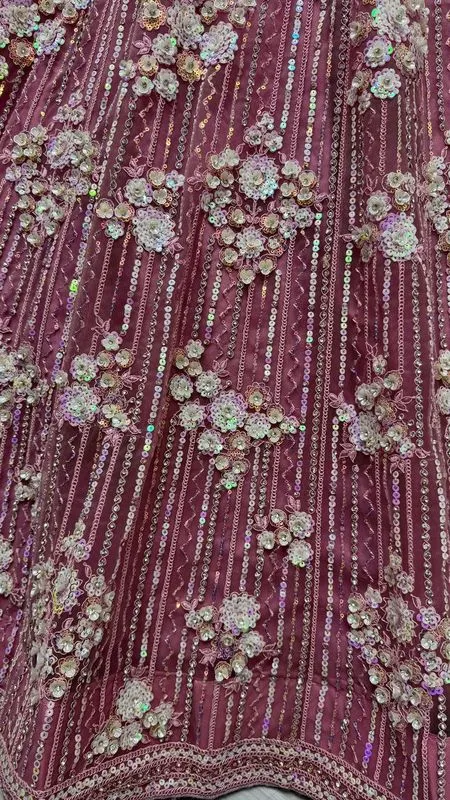 Pink Bridal Net Lehenga with Stunning Embroidery and Stone Work